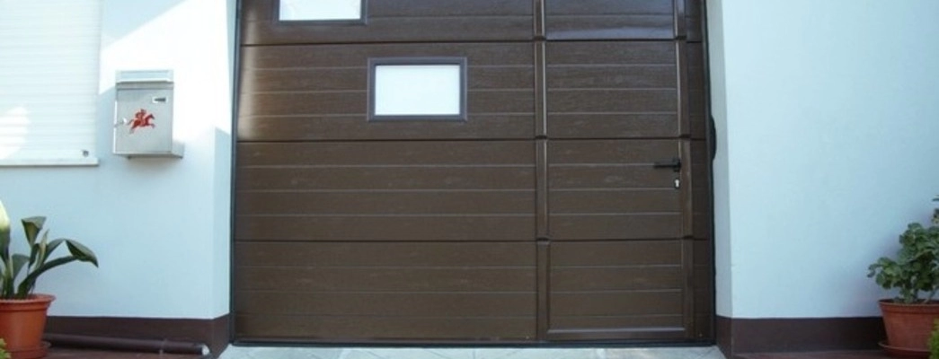 cout d’une porte de garage sectionnelle avec portillon
